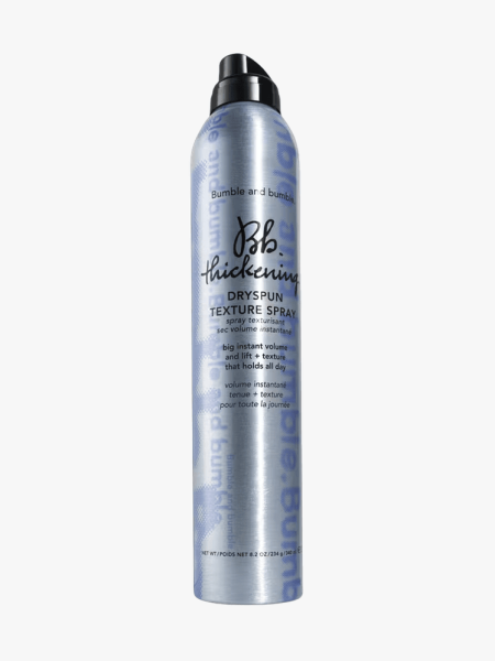 Bumble & Bumble Thickening Dryspun Texture Spray in branded component on a light gray background